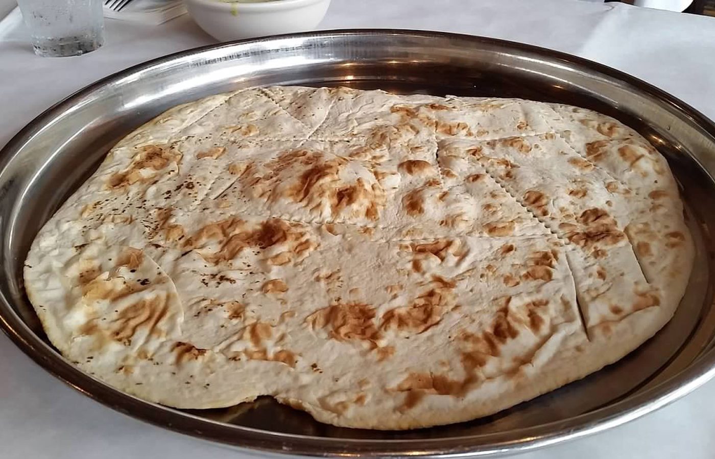 Fresh-baked Persian flatbread served at Reza's Restaurant